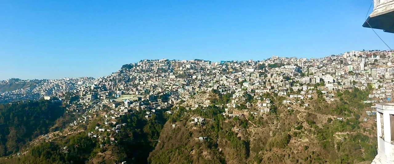 Panoramic view of hillside homes in Aizawl
